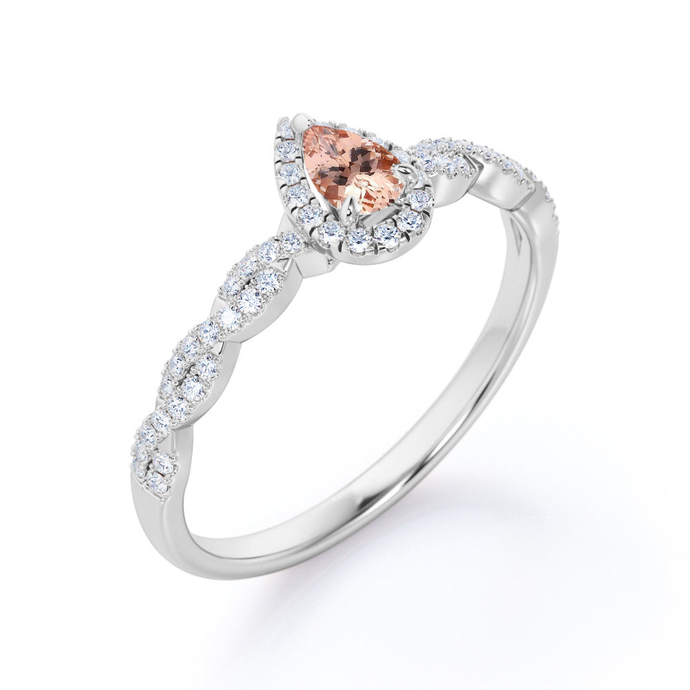 Twisted halo 1 carat Pear cut Morganite and diamond infinity engagement ring in Rose gold