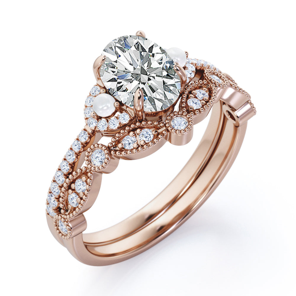 Artistic art deco inspired 1.5 carat Oval shaped Moissanite, diamonds and pearls milgrain wedding ring set for women in Black gold