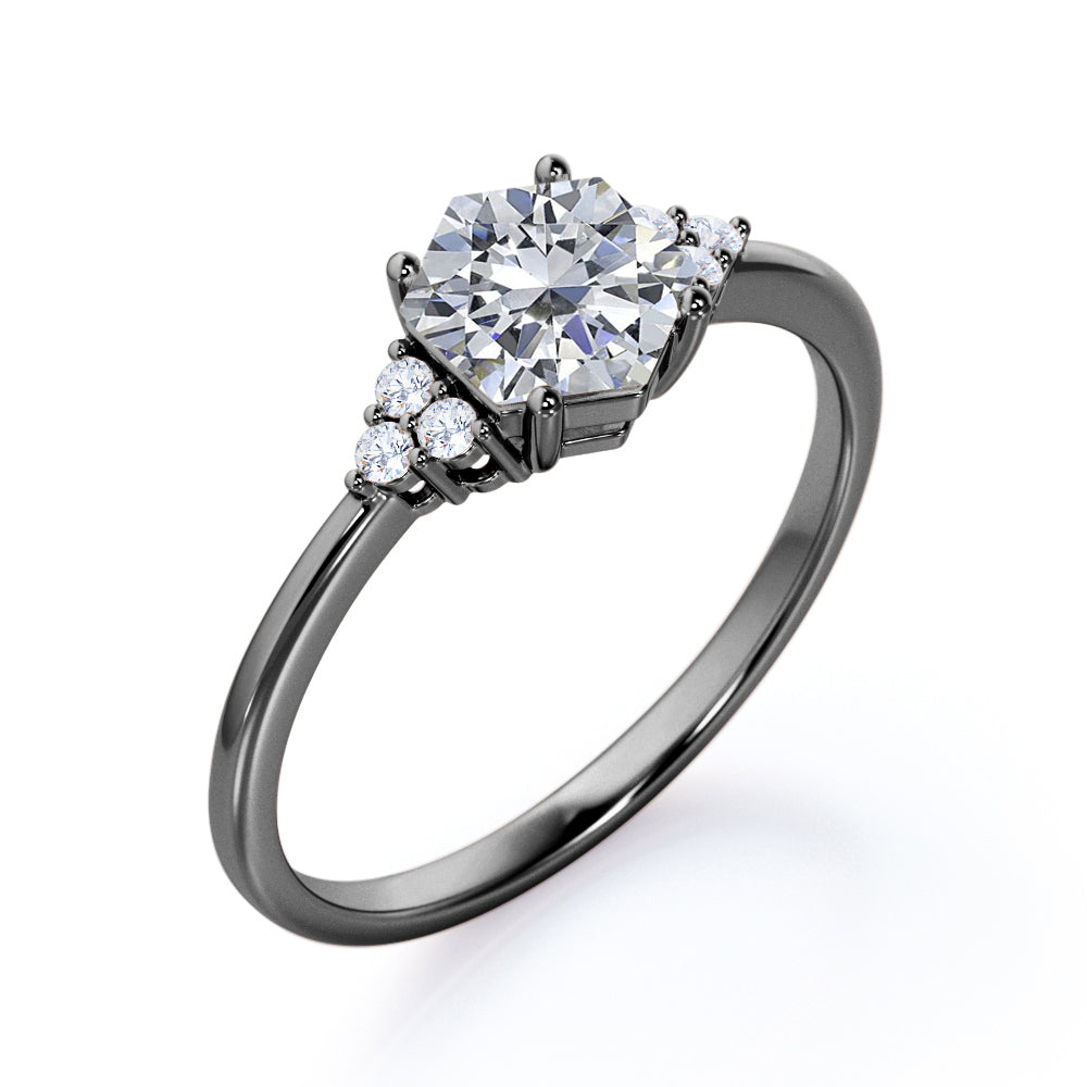 Modern 1 carat Hexagonal Moissanite and diamond tapered knife edge engagement ring in White gold