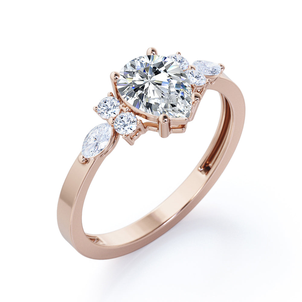 Elegant Beveled Edge 1.15 carat Pear cut Moissanite and diamond engagement ring in White gold