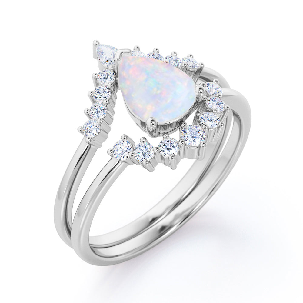 Royal Crown inspired 1.15 carat Pear cut Opal and diamond chevron wedding ring set for women in Rose gold