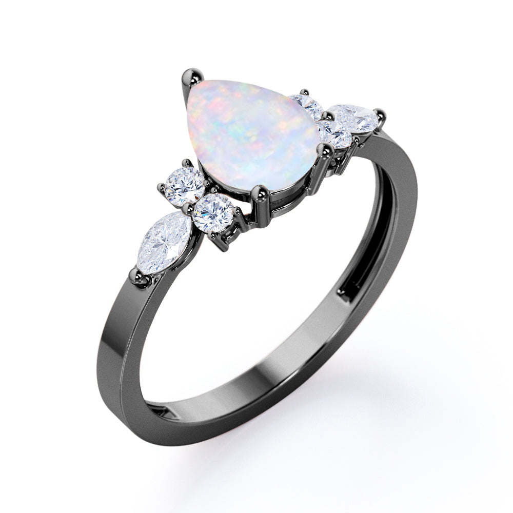 Authentic 7 stone 1.3 carat tear drop shape Opal and diamond 3 prong pear engagement ring in White gold