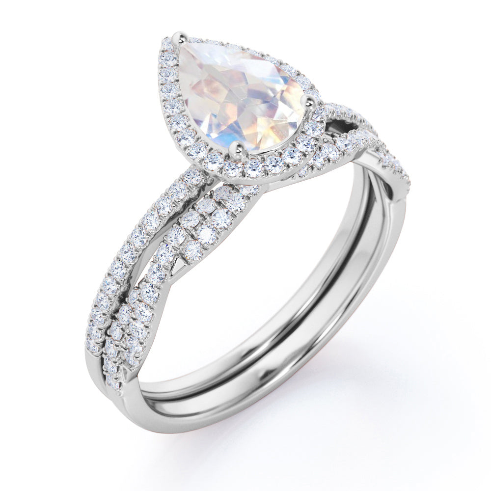 Exquisite 1.75 carat Pear cut Rainbow Moonstone Engagement ring with matching half eternity wedding ring band in gold