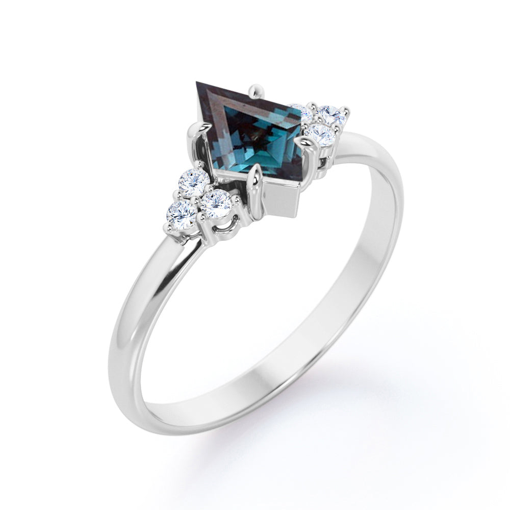 Eccentric Claw prong 1.1 carat Kite shaped Synthetic Alexandrite and diamond multistone engagement ring in Rose gold