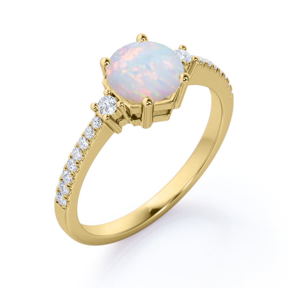 Contemporary 3 stone 1.2 carat Round cut Ethiopian Opal and diamond basket setting low basket setting engagement ring in White gold