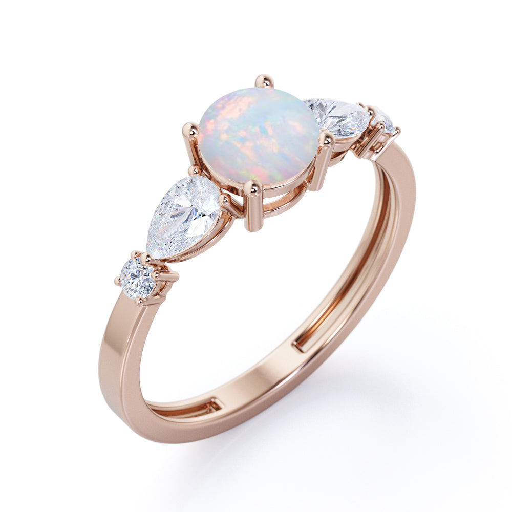 Eccentric 1.25 carat Round cut Ethiopian Opal and marquise and dot diamond engagement ring in Rose gold