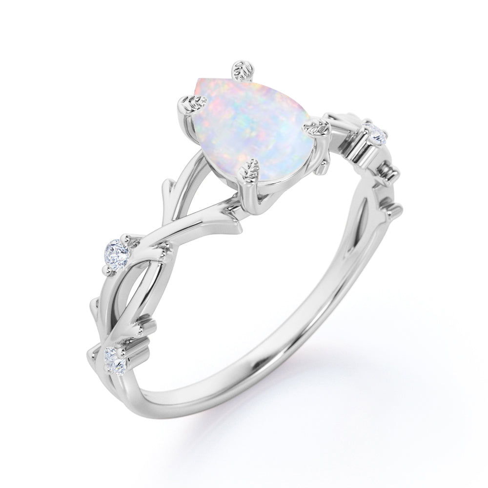 Vintage twig 1 carat Pear cut Ethiopian Opal and diamond forest engagement ring in White gold