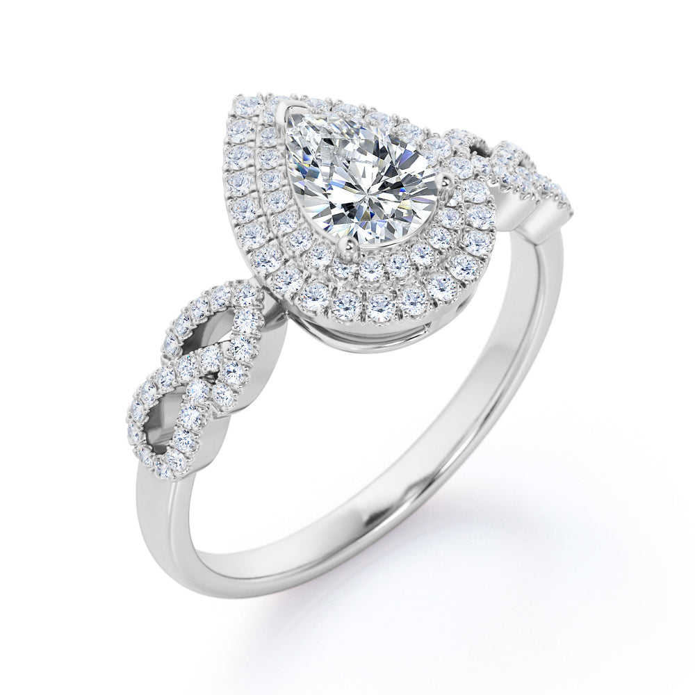 Artistic infinity 1.75 carat Pear cut Moissanite and diamond vintage halo engagement ring in Black gold