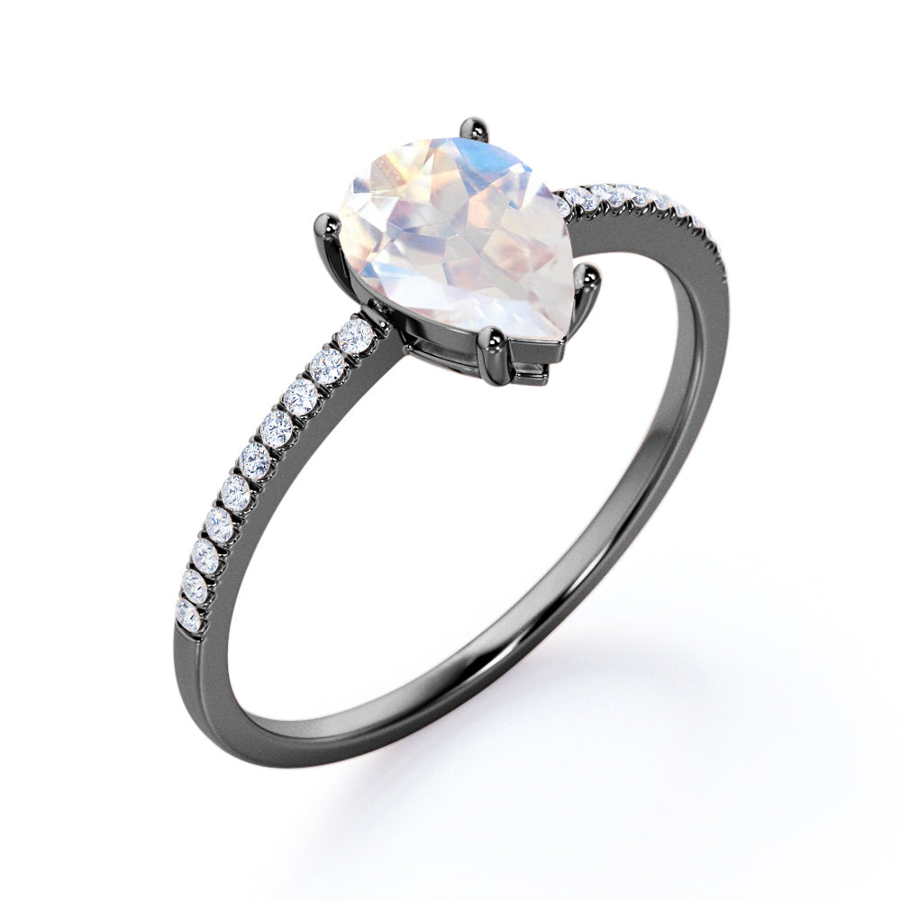 Affordable 1.25 carat Pear shaped Moonstone and diamond half-eternity engagement ring in Rose gold