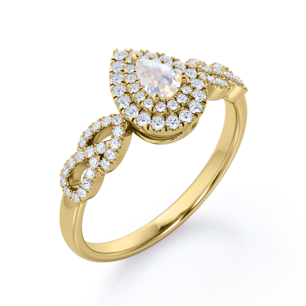 Intertwined 1.7 carat Pear shaped Blue Moonstone and diamond twisted infinity halo engagement ring in White gold