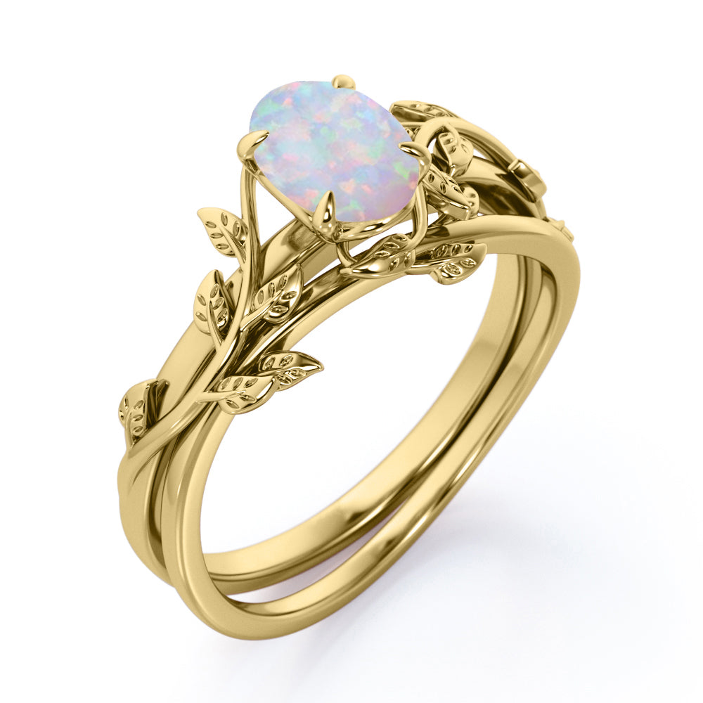 Delicate 1 carat Oval Shaped Ethiopian Opal Nature-inspired Vintage style Engagement ring in Rose gold