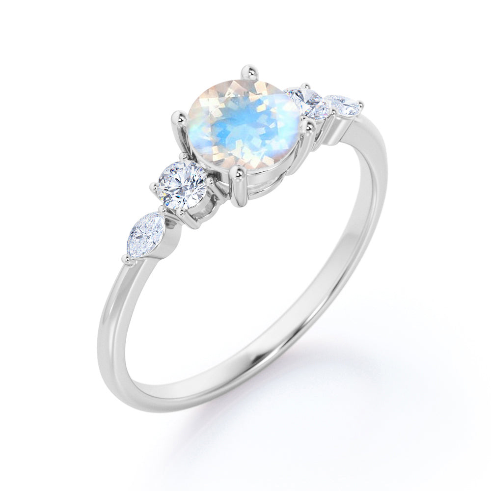 Artistic Five stone 1.1 carat Round cut Moonstone and diamond pinched shank engagement ring in Black gold