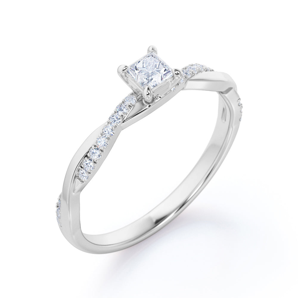 Delicate 0.7 carat Princess cut Moissanite and diamond twisted infinity engagement ring in Rose gold