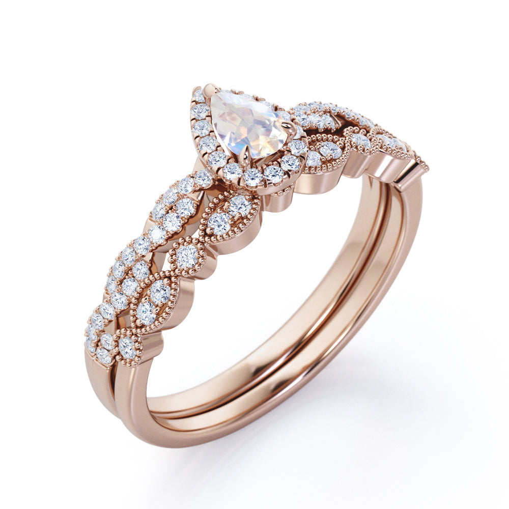 Art deco Milgrain 1.65 carat Pear cut Moonstone and diamond twisted pave engagement ring in yellow gold