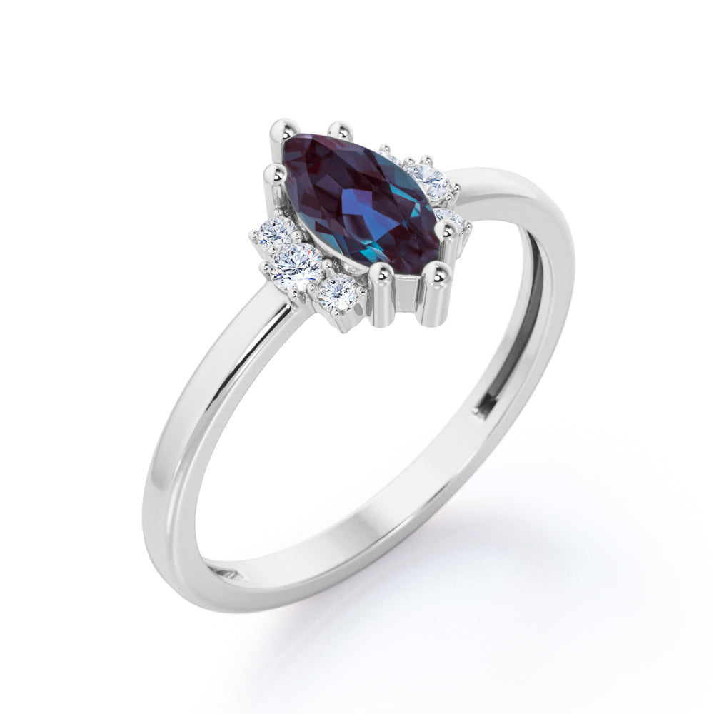 Unique 1.1 carat Marquise shaped Synthetic Alexandrite and diamond floral engagement ring in Black gold