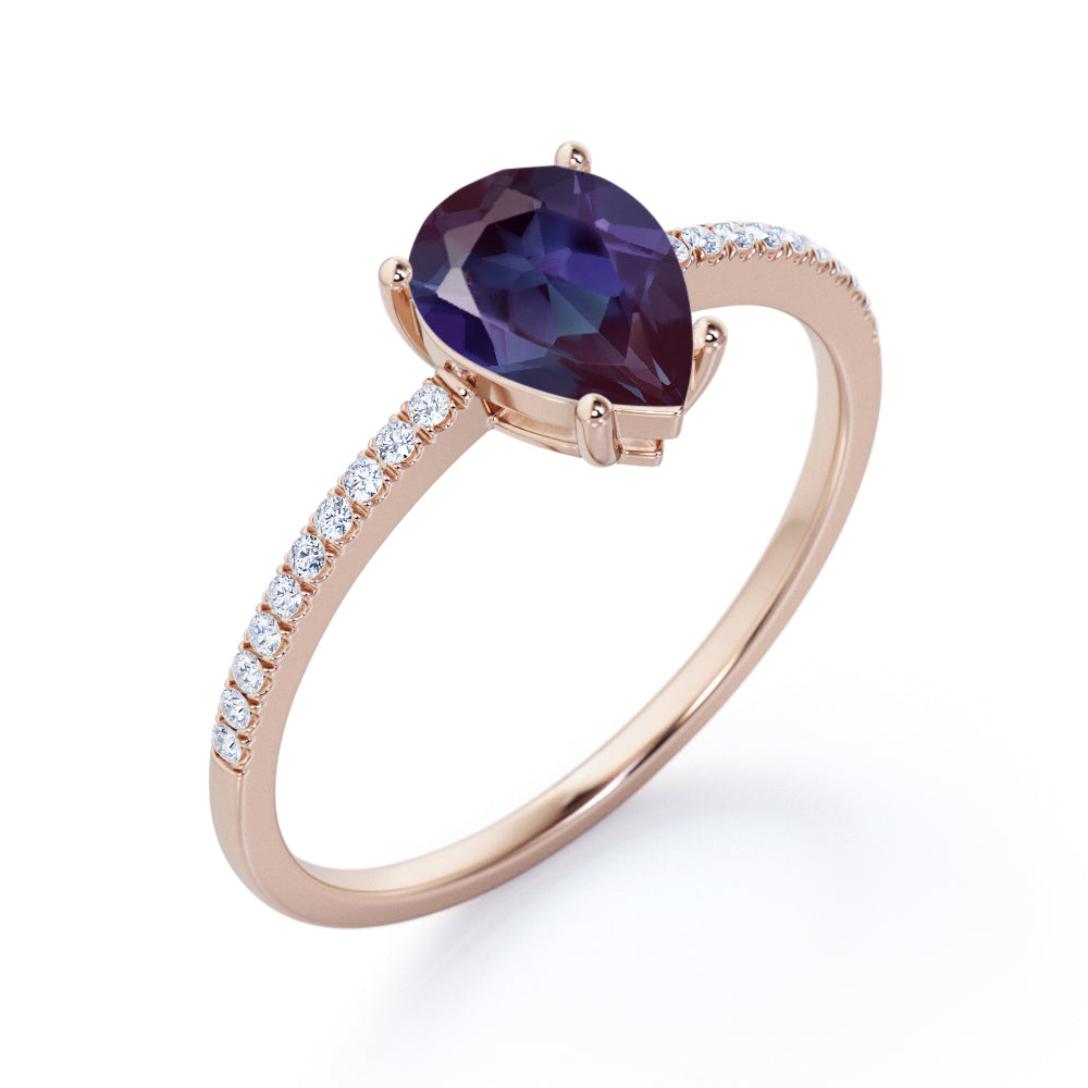 Classic 1.25 carat Pear cut Alexandrite and diamond eternity engagement ring in White gold