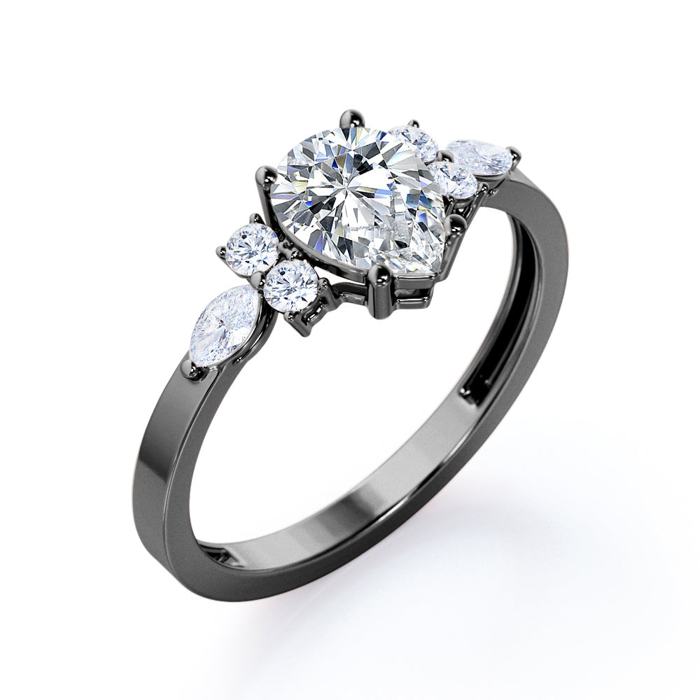 Elegant Beveled Edge 1.15 carat Pear cut Moissanite and diamond engagement ring in White gold