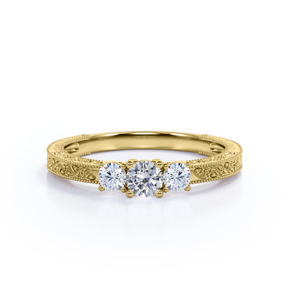 Three stone 0.49 carat Round cut Diamond Filigree Engagement ring in Gold