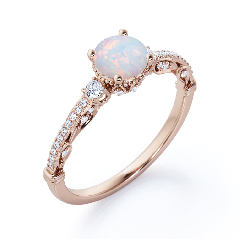 Artistic 3 stone 1.30 carat Round cut Ethiopian Opal and diamond antique art deco engagement ring in Black gold