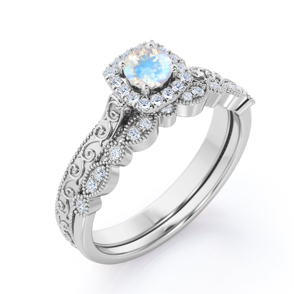 Antique Filigree and Milgrain 1.5 carat Round cut Moonstone and diamond square halo engagement ring in yellow gold