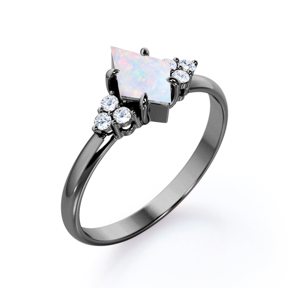 Exquisite Bezel 1.25 carat Kite shaped Australian Opal and diamond seven stone engagement ring in White gold