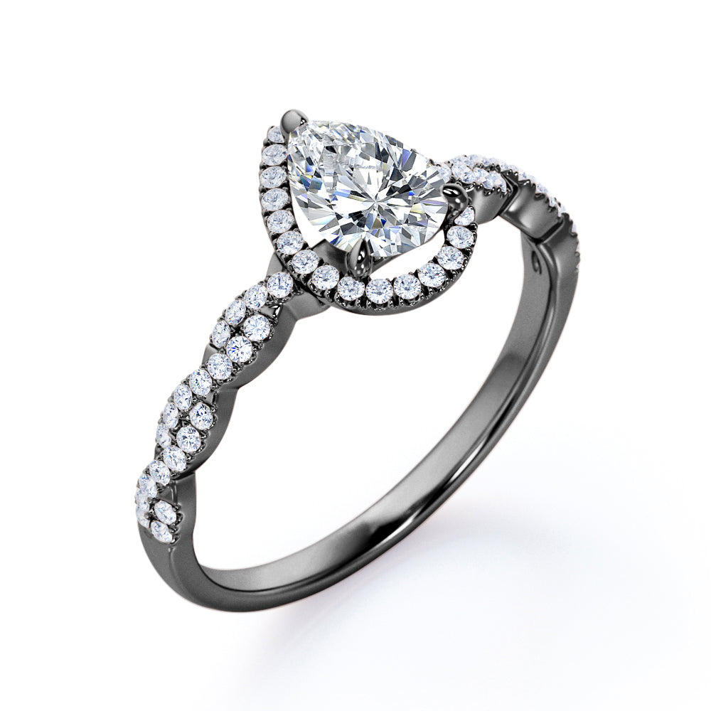 Twisted rope style 1.5 carat Pear cut Moissanite and diamond infinity halo engagement ring in Rose gold
