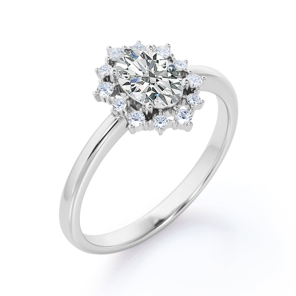 Snowflake cluster 1.25 carat Oval cut Moissanite and diamonds Halo engagement ring in Rose gold