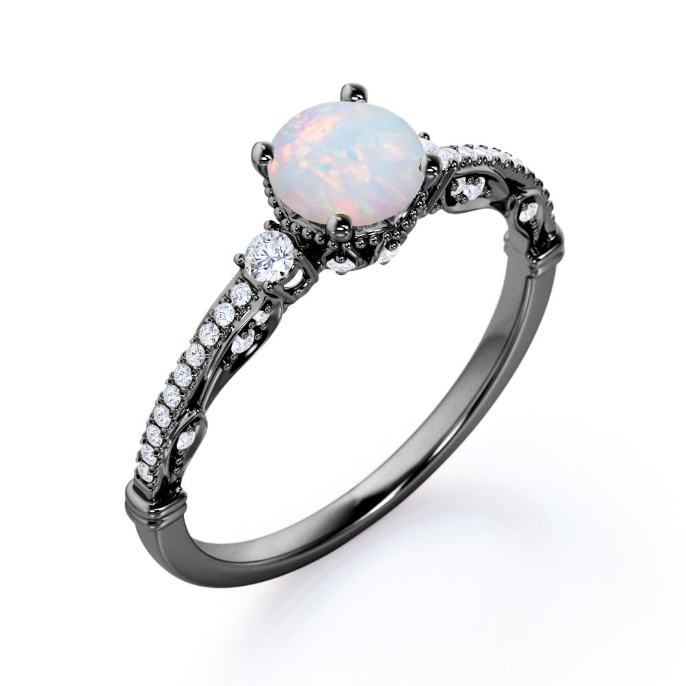 Artistic 3 stone 1.30 carat Round cut Ethiopian Opal and diamond antique art deco engagement ring in Black gold