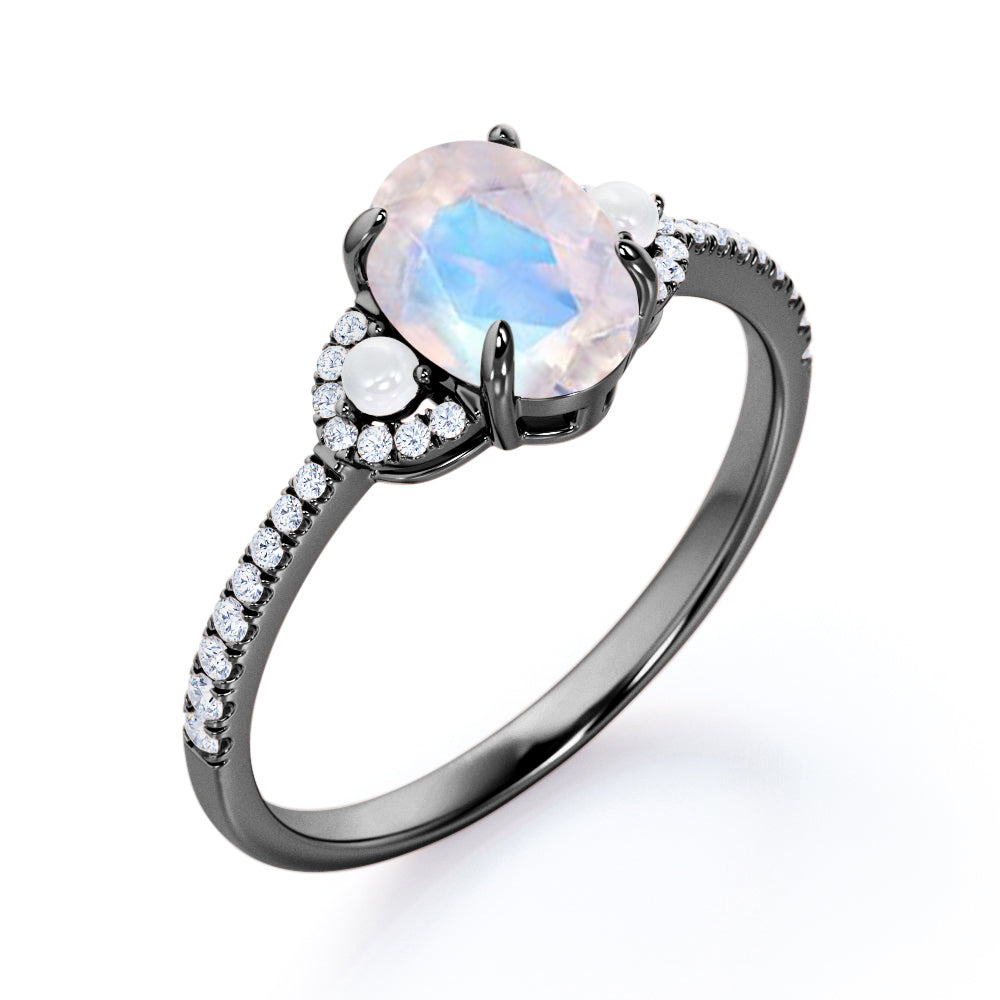 Pretty Pearls 1.5 carat Oval cut Moonstone and diamond traditional engagement ring in White gold