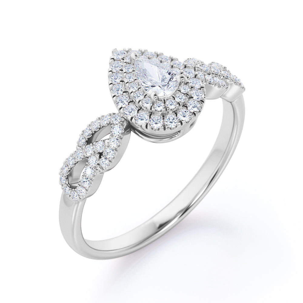 Stylish leaf inspired 0.75 carat Pear cut diamond double halo pear engagement ring in White gold