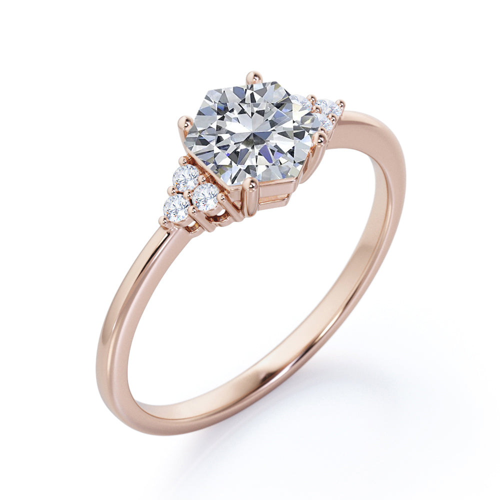Modern 1 carat Hexagonal Moissanite and diamond tapered knife edge engagement ring in White gold