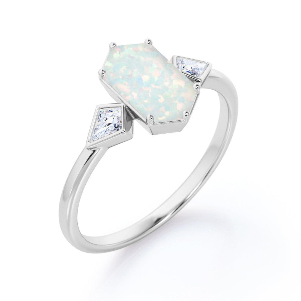 Elongated 1.10 carat Hexagonal Opal and marquise diamond bezel set engagement ring in Black gold