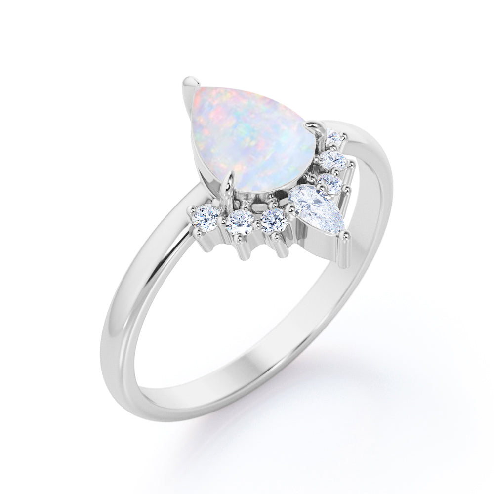 Antique Crown inspired 1.15 carat Pear cut Ethiopian Opal and diamond claw prong setting engagement ring in Rose gold