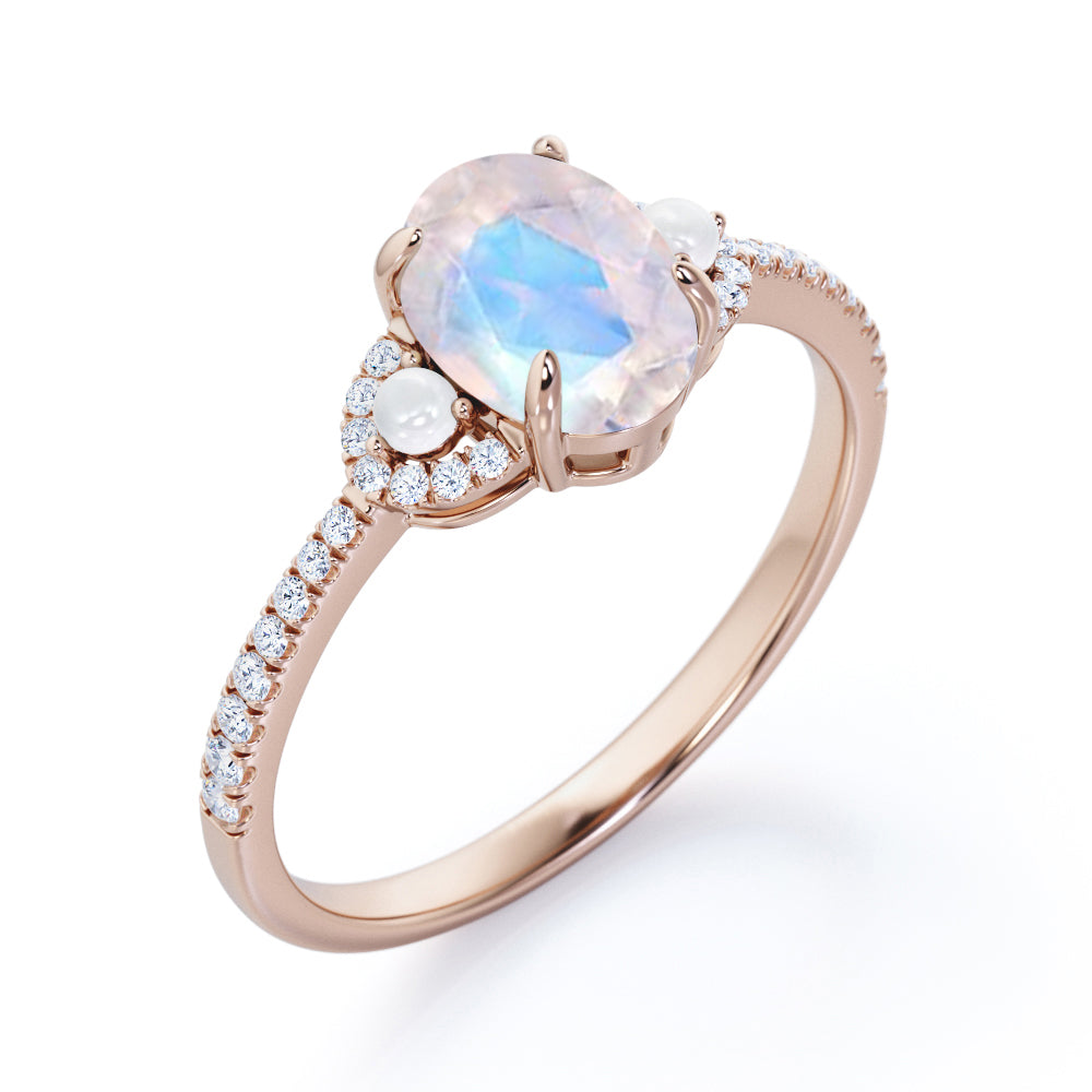 Pretty Pearls 1.5 carat Oval cut Moonstone and diamond traditional engagement ring in White gold