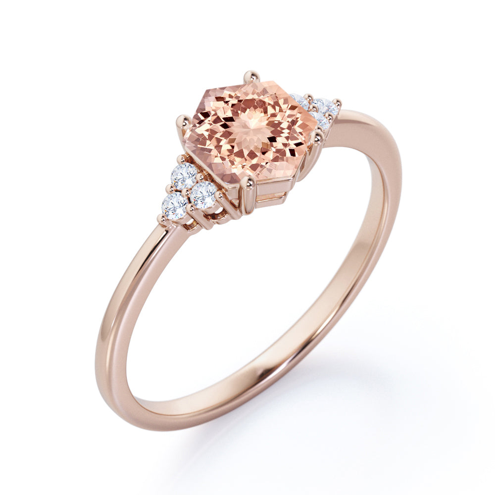 Tapered 0.55 carat Hexagonal Morganite and diamond 7 stone engagement ring in Black gold