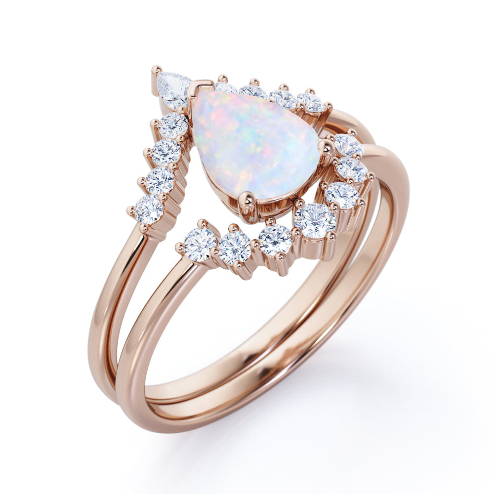 Royal Crown inspired 1.15 carat Pear cut Opal and diamond chevron wedding ring set for women in Rose gold
