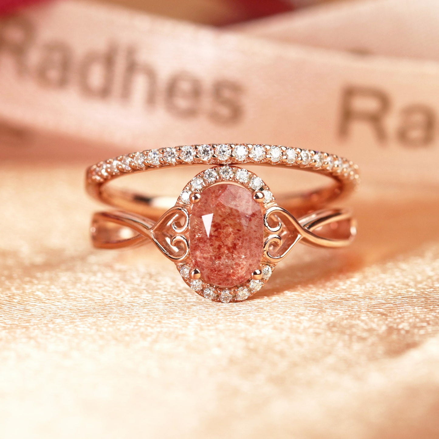 Twisted Heart Shank 1.25 carat Oval Shaped Strawberry Quartz and Diamond Semi-halo Wedding Ring Set for Women with Matching Semi-eternity Wedding Band in Rose Gold