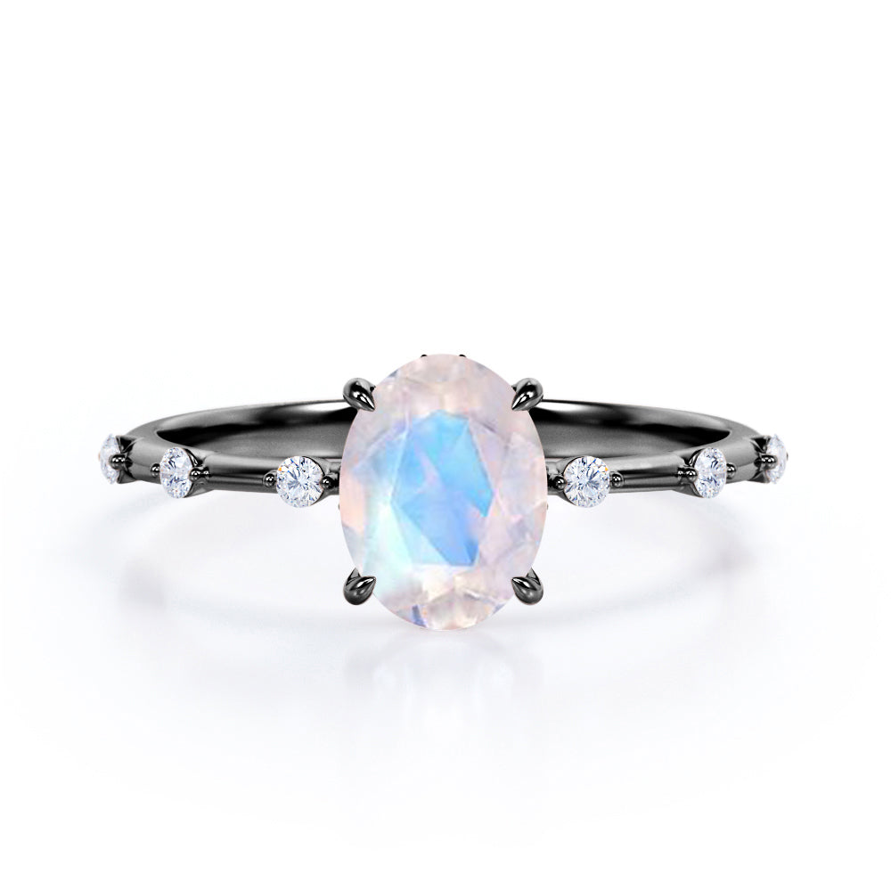 Branch Twig 1.1 carat Oval shaped Moonstone and diamond dainty engagement ring in Black gold