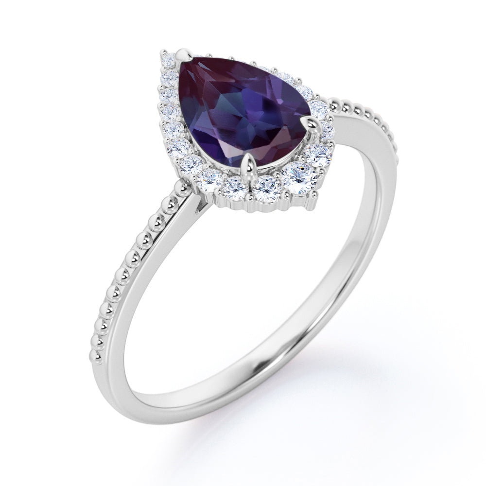 Crown Milgrain 1.25 carat Pear shaped Synthetic Alexandrite and diamond halo style engagement ring in Rose gold