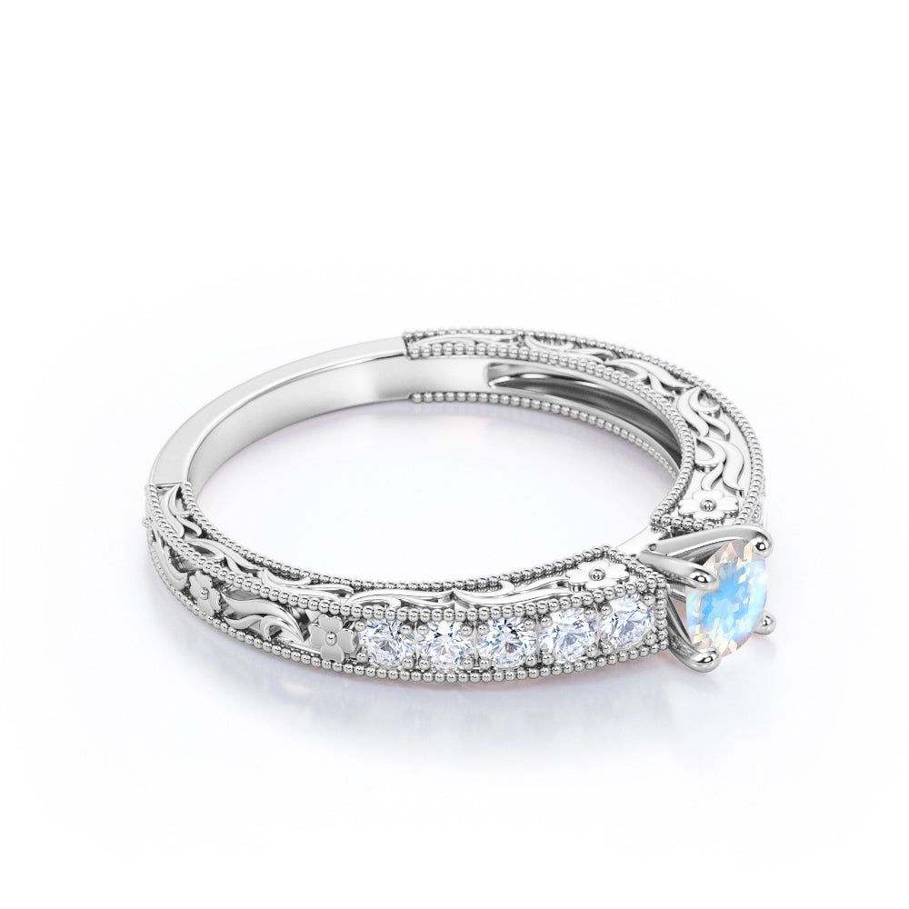 Art deco Cathedral 1.25 carat Round cut Blue Moonstone and diamond Milgrain and Filigree engagement ring in White gold