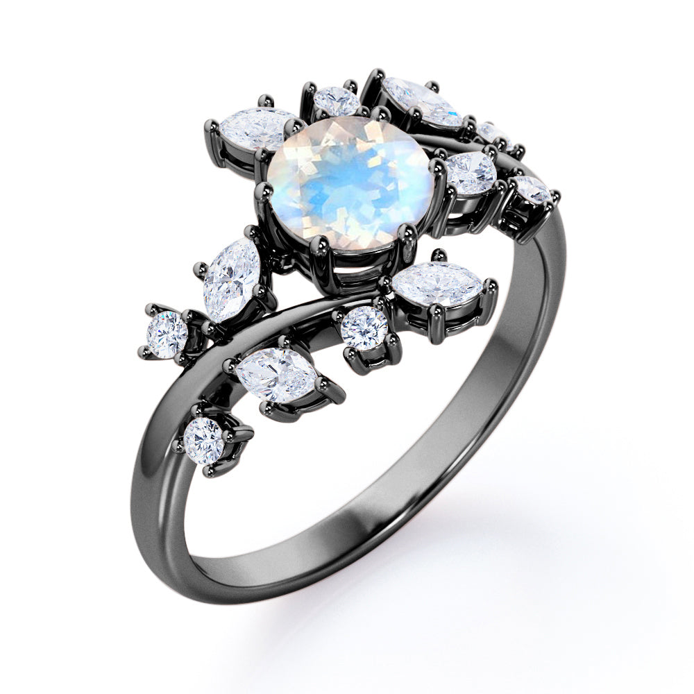 Floral Branch and leaf 1.25 carat Round cut Blue Moonstone and diamond tension set engagement ring in Black gold