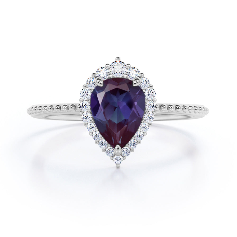 Crown Milgrain 1.25 carat Pear shaped Synthetic Alexandrite and diamond halo style engagement ring in Rose gold
