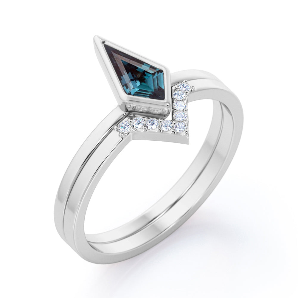 Matching Chevron Bezel 1.15 carat Kite shaped Synthetic Alexandrite and diamond solitaire wedding ring set in White gold