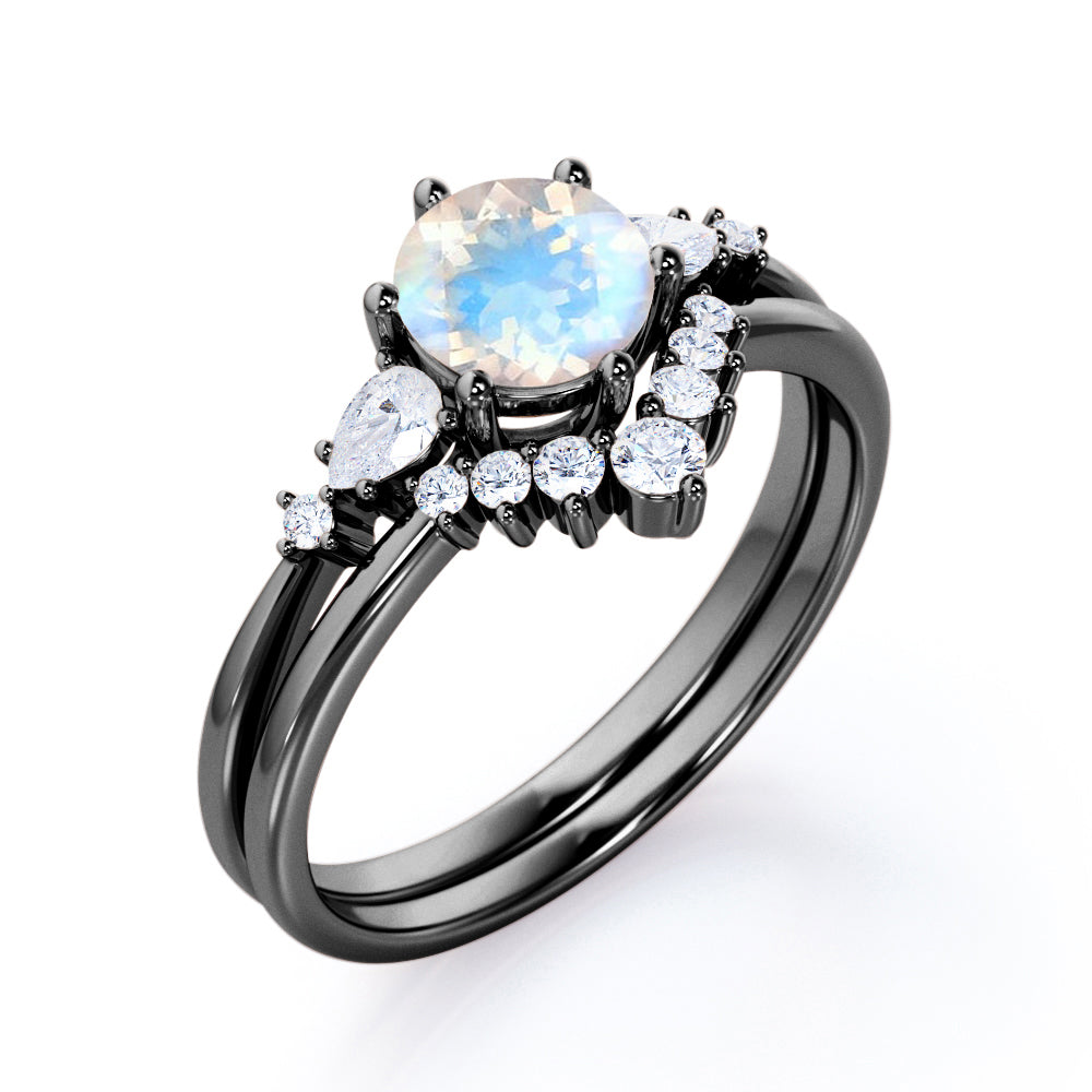 Antique Chevron 1.4 carat Round cut Blue Moonstone and diamond tapered style Bridal set for women in Black gold