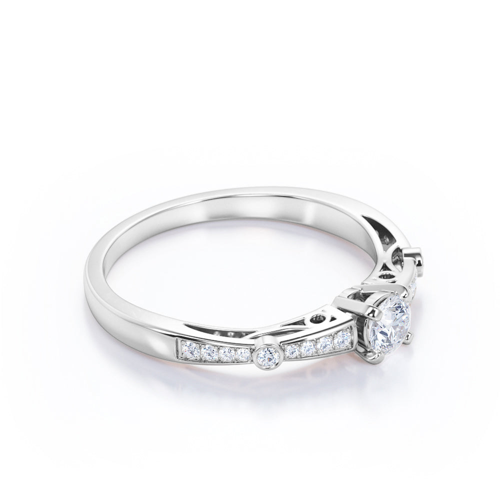 Elegant Baguette style 0.75 carat Round cut Moissanite and diamond channel setting engagement ring in White gold