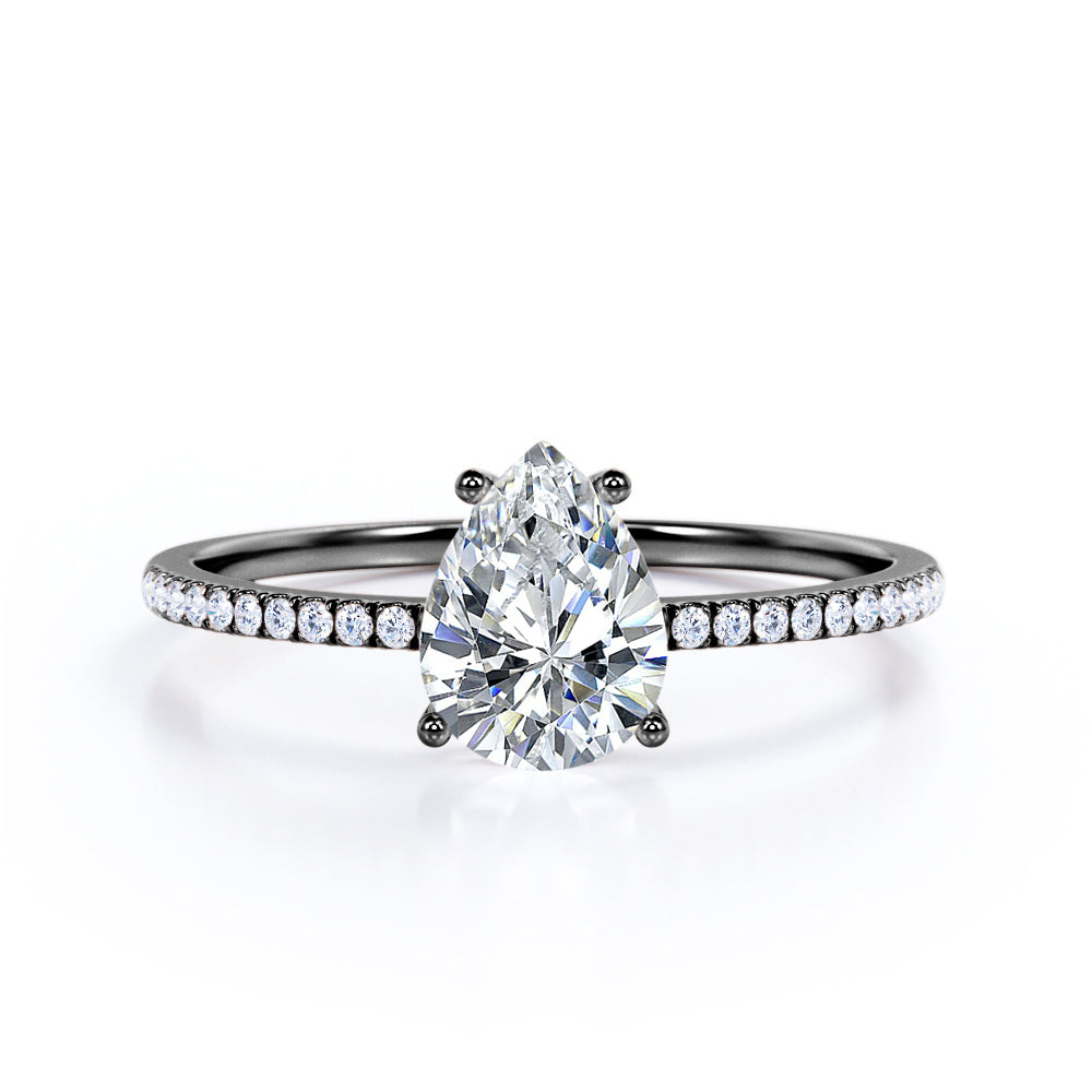 Elegant 1.2 carat Pear shaped Moissanite and diamond vintage prong engagement ring in Black gold