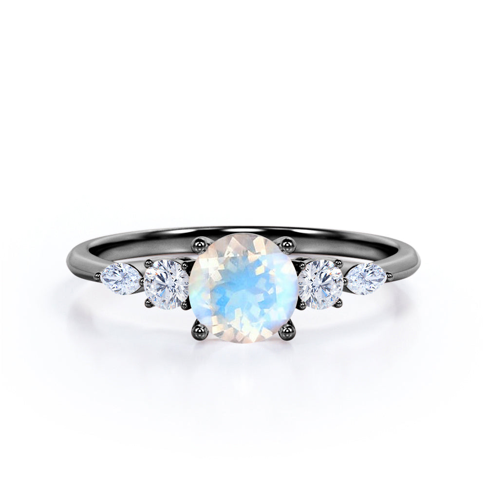 Artistic Five stone 1.1 carat Round cut Moonstone and diamond pinched shank engagement ring in Black gold