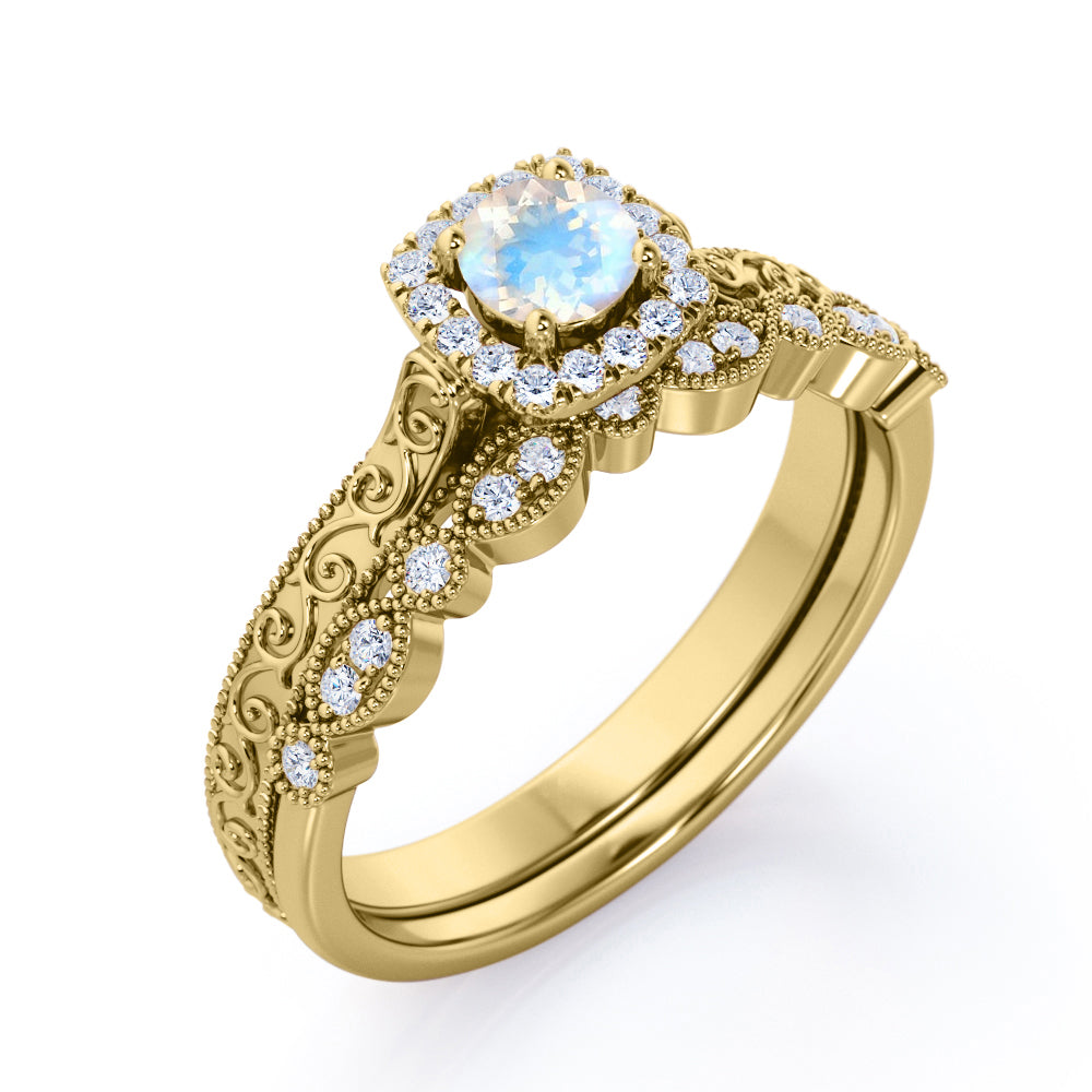 Antique Filigree and Milgrain 1.5 carat Round cut Moonstone and diamond square halo engagement ring in yellow gold