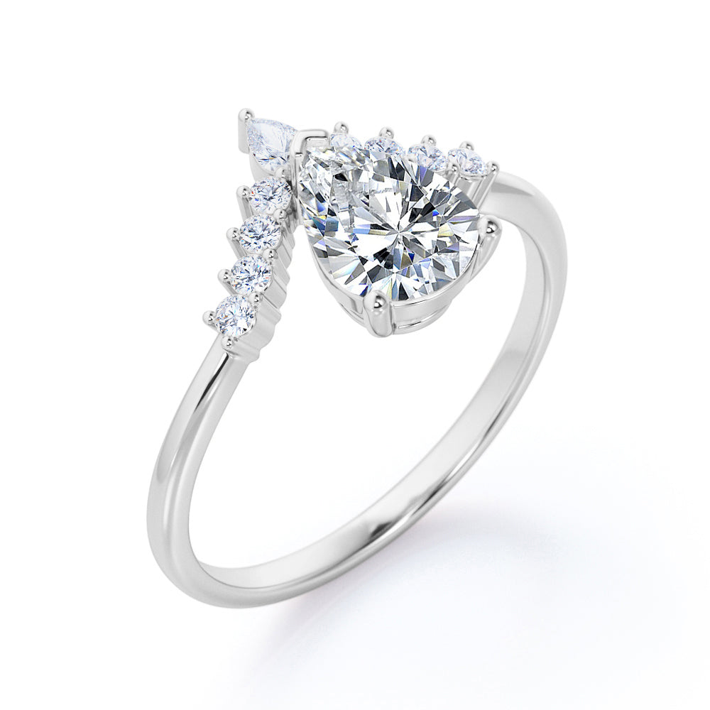 Antique V-shaped 1.15 carat Pear cut Moissanite and diamond engagement ring in White gold