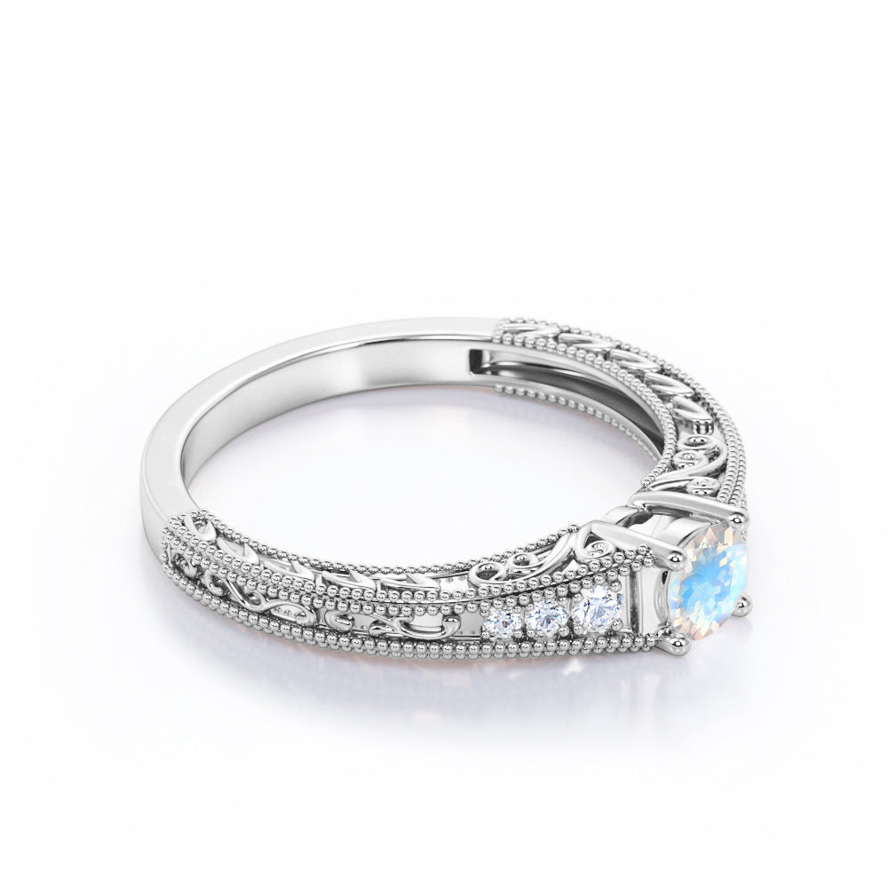 Exquisite Double Beaded 0.6 carat Round cut Moonstone and diamond filigree style engagement ring in White gold